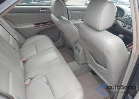 2003 Toyota Camry Le from USA, damaged, VIN 4T1BE32K23U124984